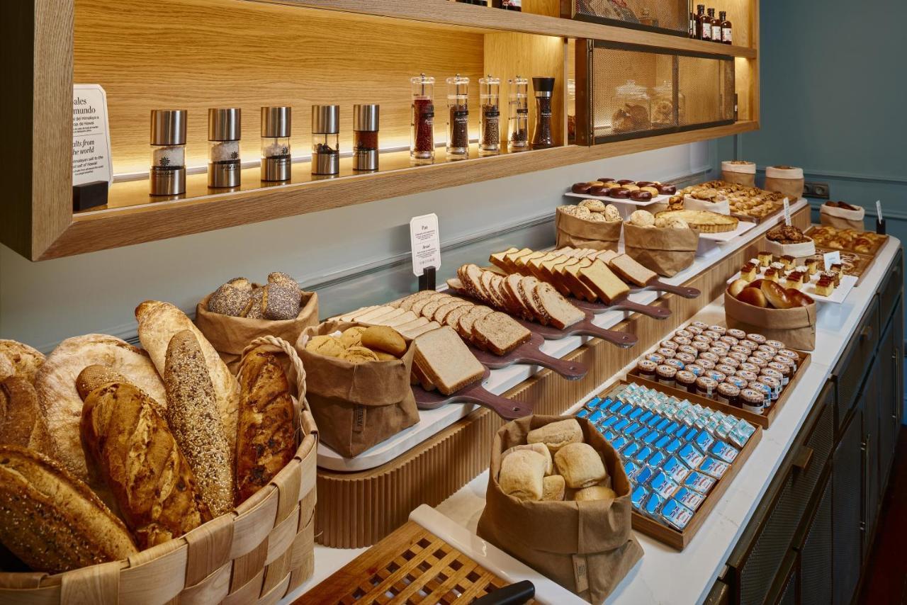 Palacio De Aviles Affiliated By Melia Eksteriør bilde Bread and pastry at a buffet