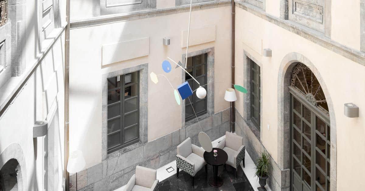 Palacio De Aviles Affiliated By Melia Eksteriør bilde The mobile in the lobby of the National Gallery of Greece